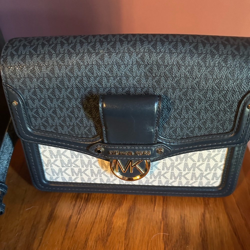 Michael Kors blue/white handbag. Used a couple times f times. In good condition